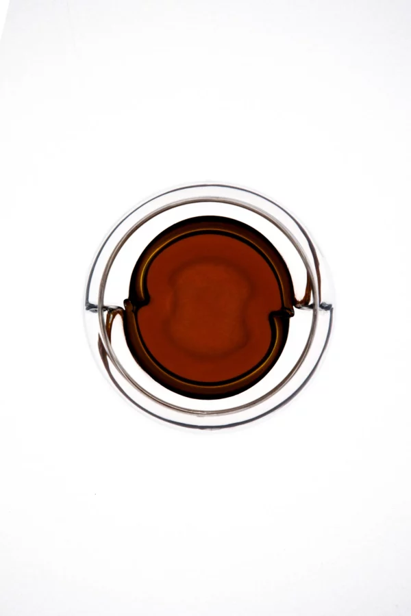icosa brewhouse avensi wave aeresso glass top view with coffee in it